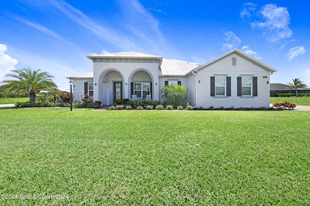 view of front of home with a front lawn