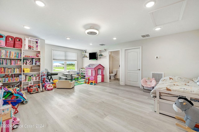 recreation room featuring light hardwood / wood-style flooring