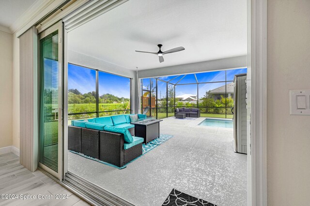 interior space with ceiling fan and plenty of natural light