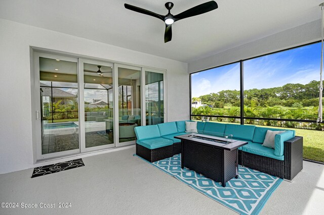 sunroom / solarium with ceiling fan