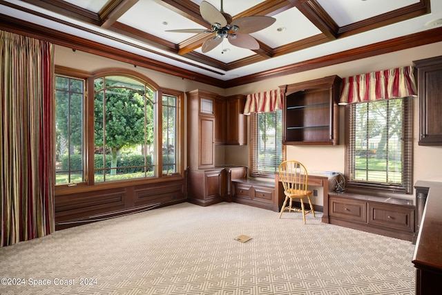 office space featuring crown molding, coffered ceiling, ceiling fan, and a wealth of natural light