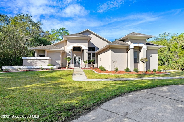 view of front facade with a front yard