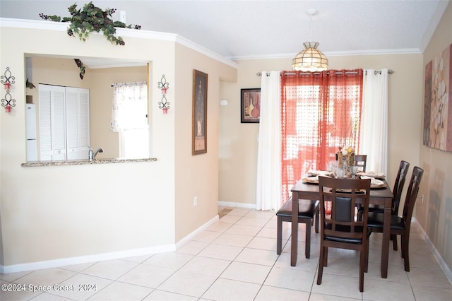 tiled dining area with ornamental molding