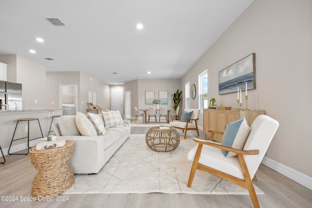 living room featuring light wood-type flooring