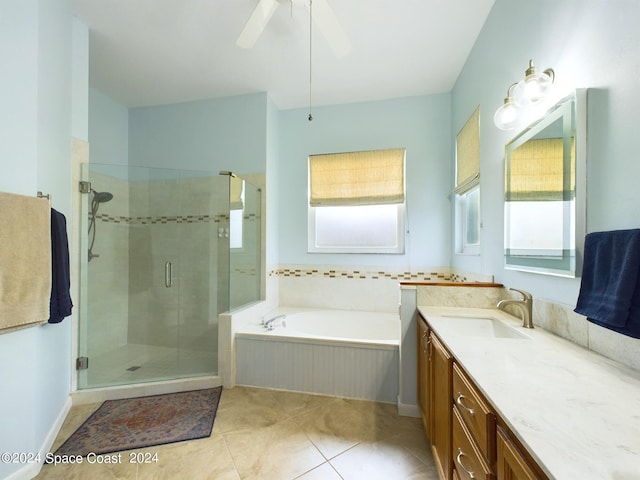 bathroom featuring vanity, plus walk in shower, ceiling fan, and tile patterned flooring