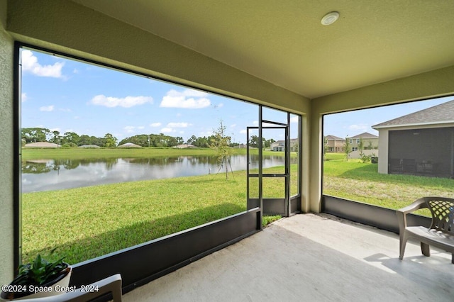 sunroom with a water view