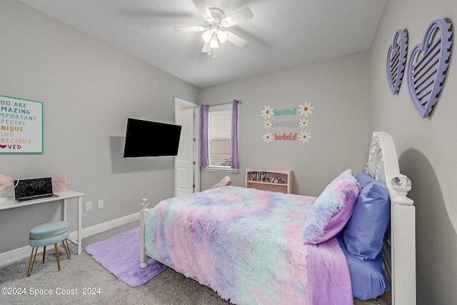 bedroom featuring ceiling fan and carpet floors