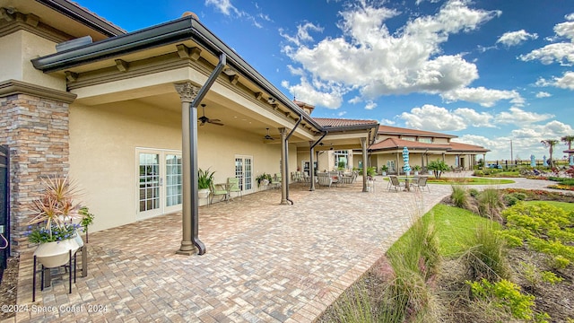 view of patio / terrace featuring ceiling fan