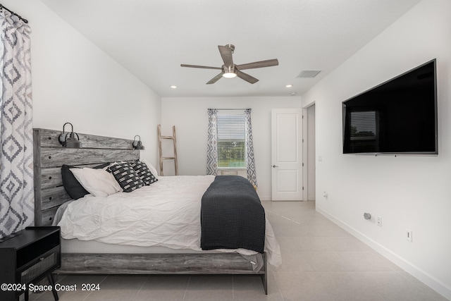 bedroom featuring ceiling fan and light tile patterned flooring