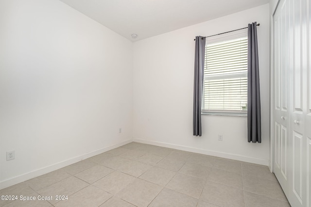 view of tiled spare room