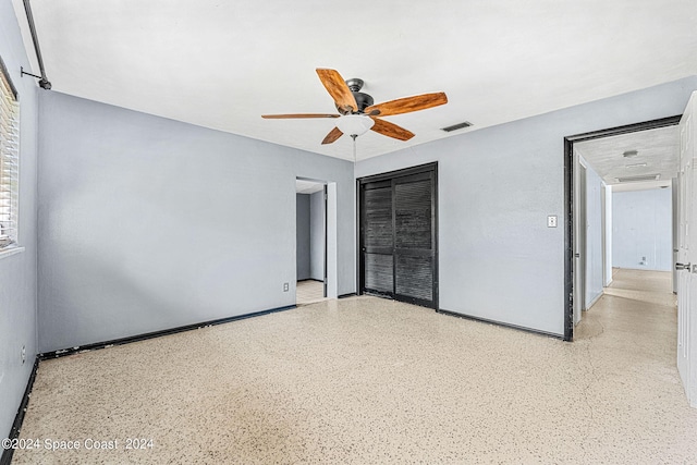 spare room featuring ceiling fan