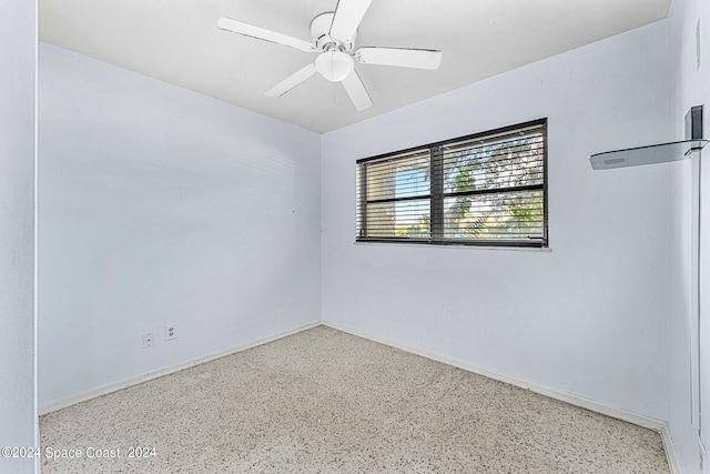 empty room featuring ceiling fan