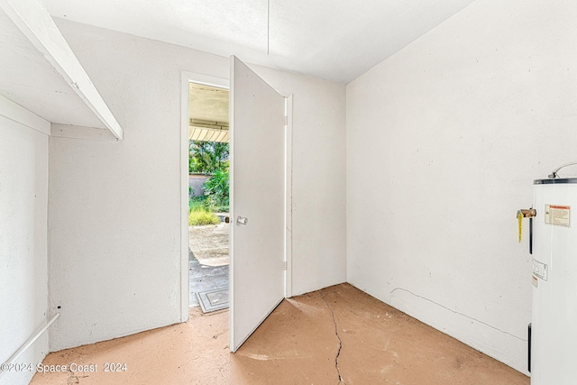 spare room featuring water heater