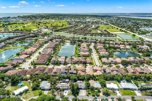 drone / aerial view with a water view