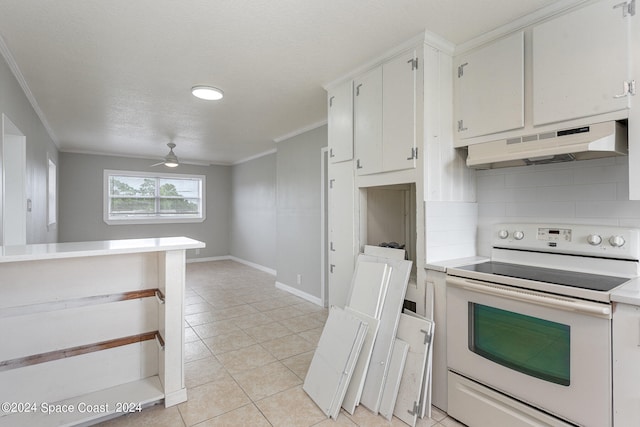 kitchen with ornamental molding, decorative backsplash, ceiling fan, white range with electric cooktop, and white cabinets