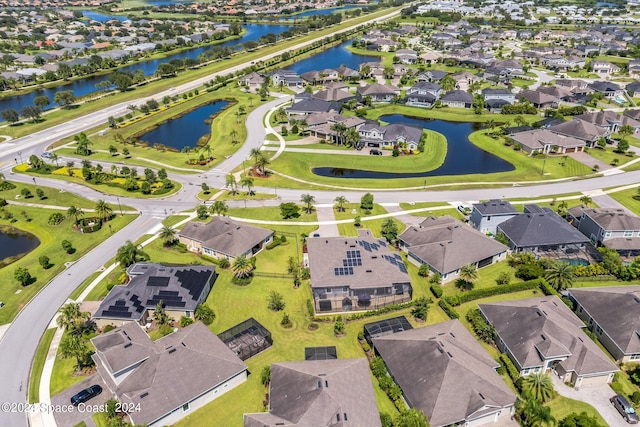 7356 Millbrook Ave, Melbourne, FL 32940 - birds eye view of property featuring a water view and a residential view