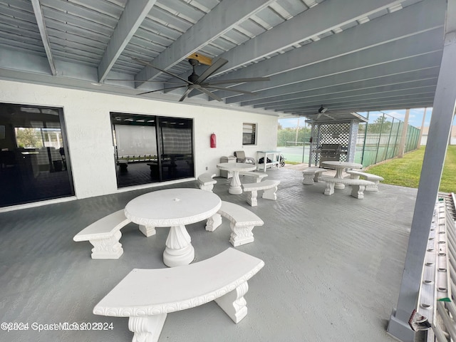 view of patio featuring ceiling fan