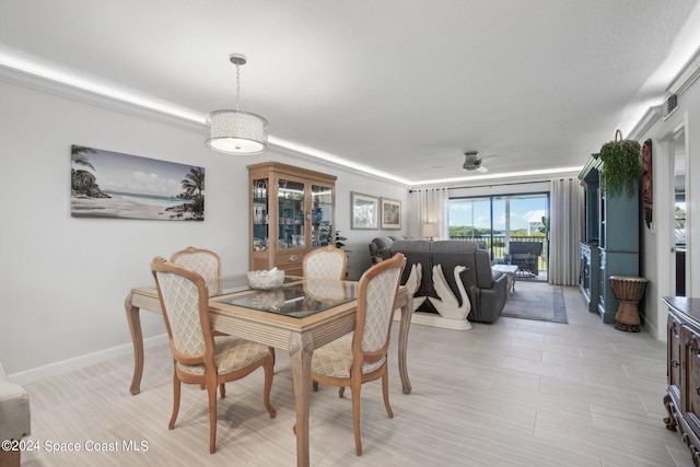 dining space with ceiling fan