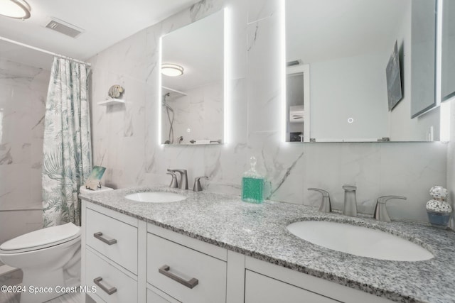 bathroom with vanity, backsplash, a shower with shower curtain, toilet, and tile walls