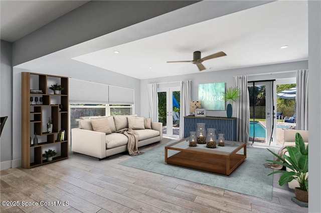 living room featuring light hardwood / wood-style flooring, french doors, and plenty of natural light