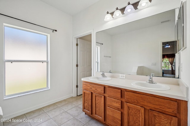 bathroom featuring vanity and tile patterned flooring