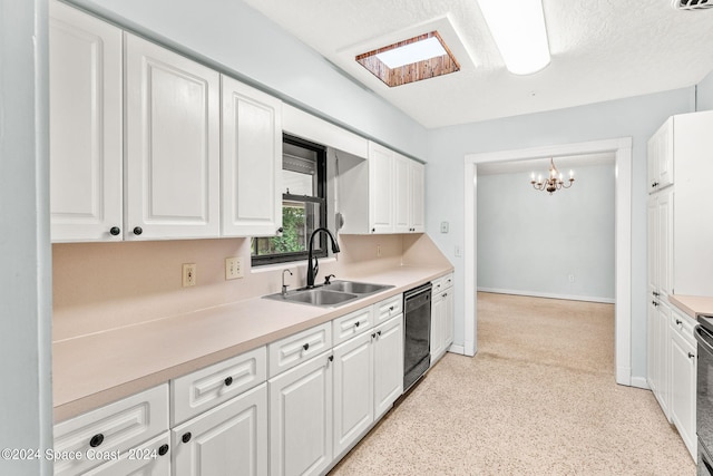 kitchen with a textured ceiling, decorative light fixtures, black appliances, sink, and white cabinets