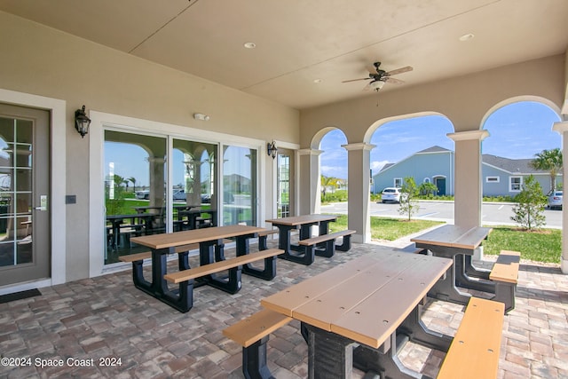 view of patio / terrace featuring ceiling fan