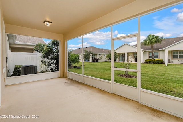 unfurnished sunroom with a wealth of natural light