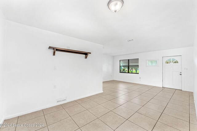 view of tiled spare room