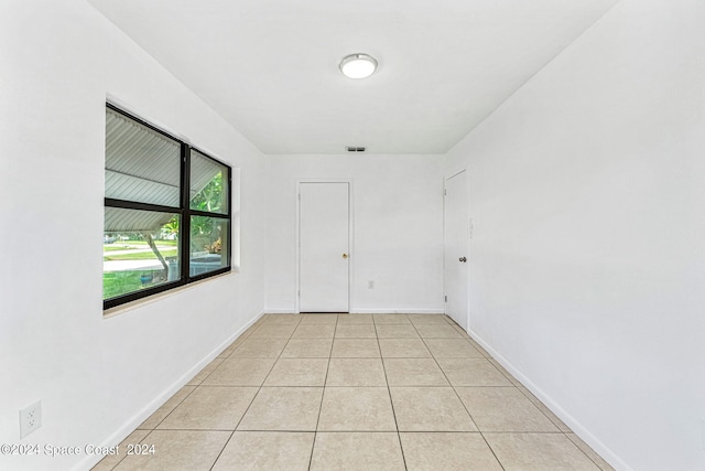 view of tiled spare room