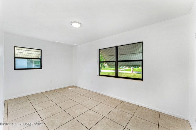 view of tiled spare room