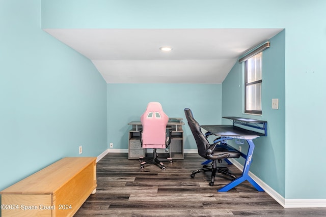 office area with dark hardwood / wood-style floors and vaulted ceiling