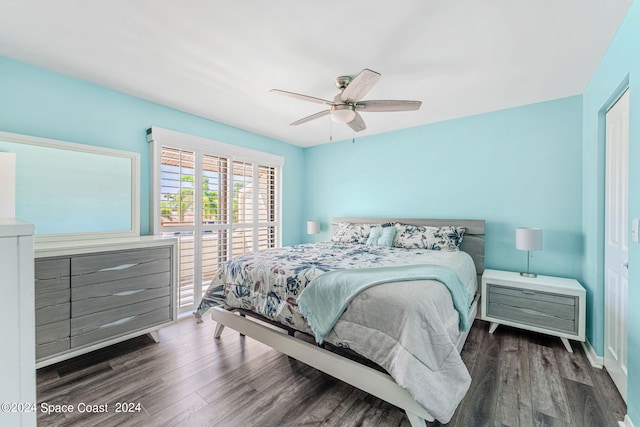 bedroom featuring ceiling fan and dark hardwood / wood-style flooring