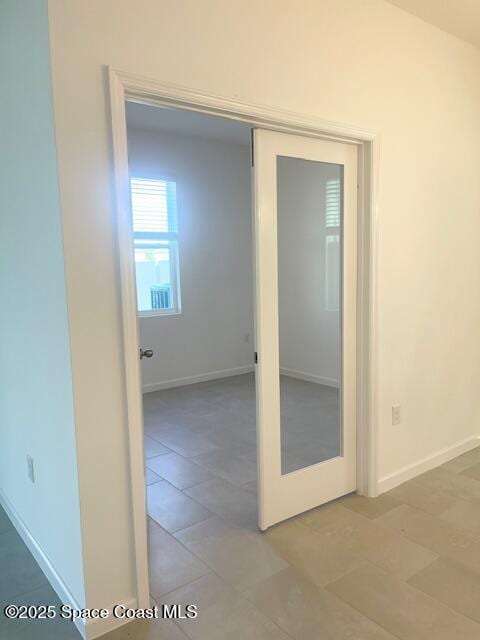 corridor with baseboards