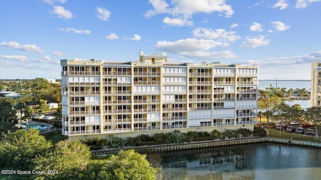 view of property with a water view