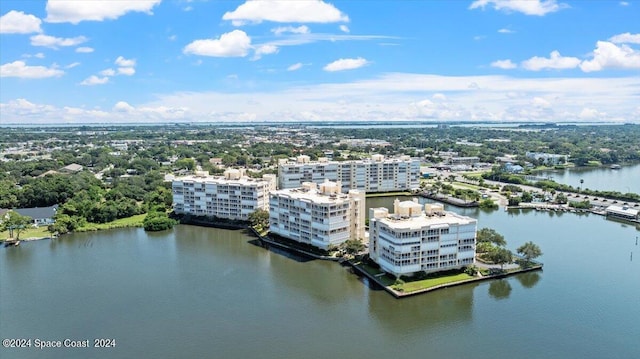 drone / aerial view with a water view