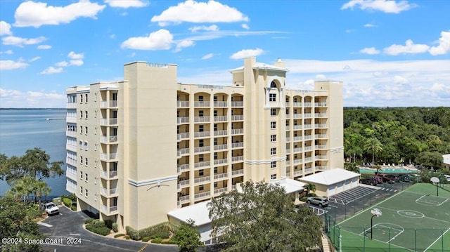 view of building exterior with a water view