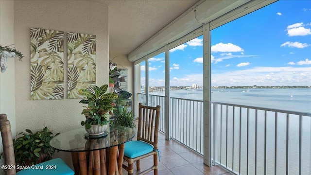 sunroom with a water view