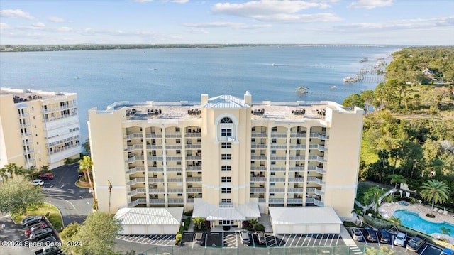 view of property with a water view