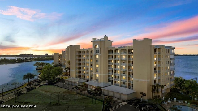 outdoor building at dusk with a water view