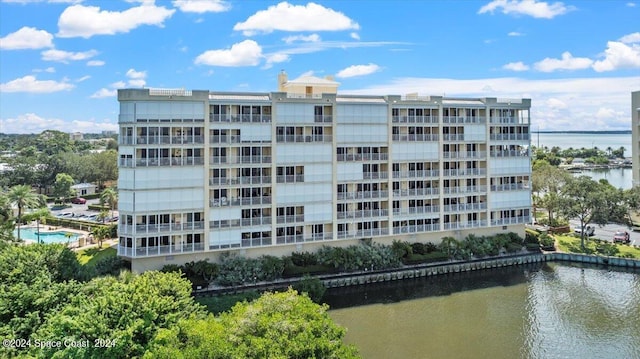 view of building exterior with a water view