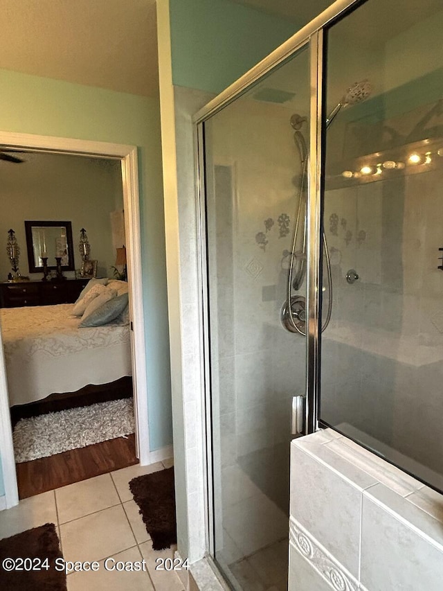 bathroom featuring tile patterned floors and walk in shower