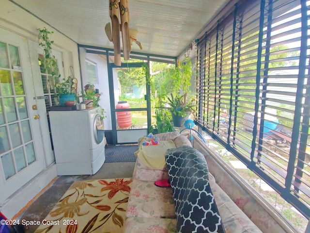 sunroom / solarium with washer / dryer and a wealth of natural light