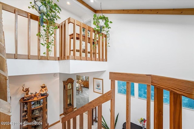 interior space featuring beam ceiling