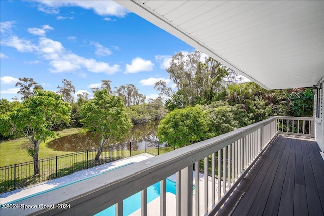 balcony featuring a water view