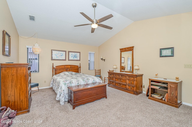 bedroom featuring lofted ceiling, light colored carpet, and ceiling fan