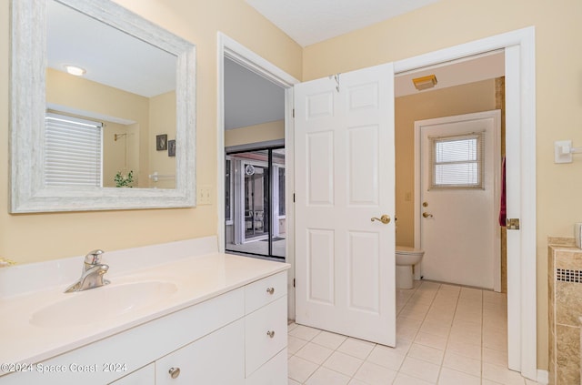 1531 Independence Ave, Melbourne, FL 32940 - bathroom with toilet, vanity, tile patterned flooring, and visible vents