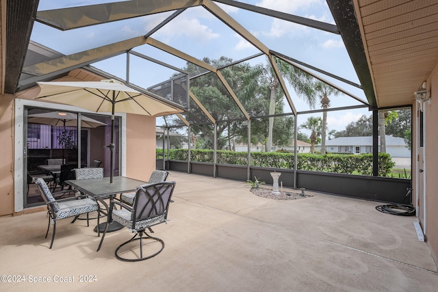 view of patio / terrace with glass enclosure