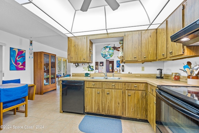 kitchen with sink, light tile patterned floors, extractor fan, and black appliances