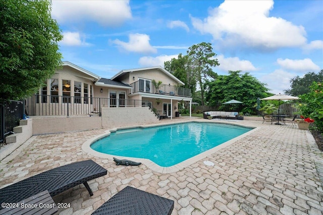 view of pool with a patio area